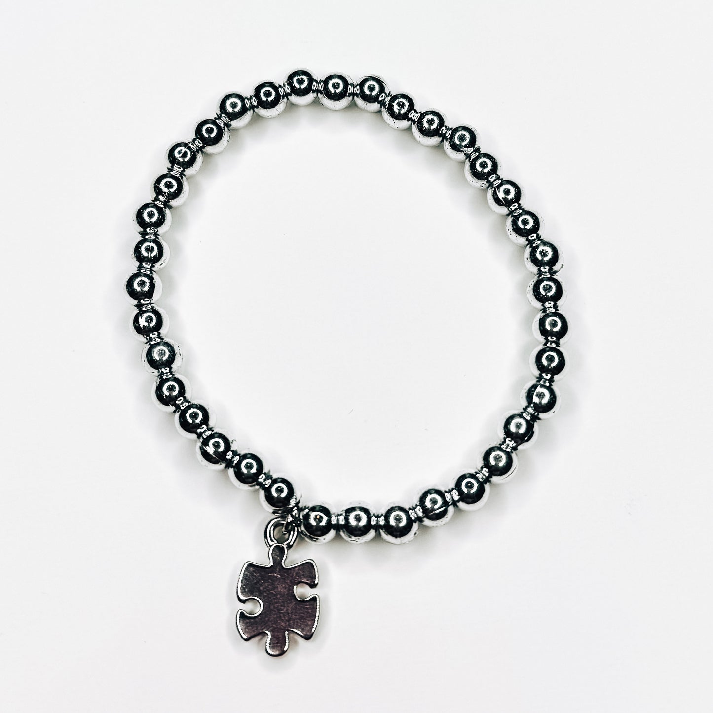 Silver Puzzle Piece Charm Bracelet