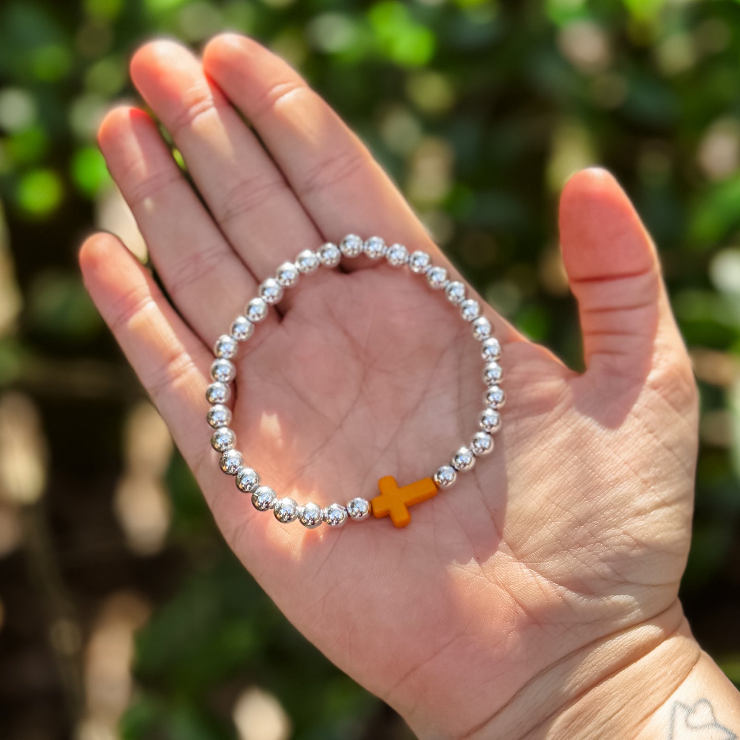 Orange Cross Silver Beaded Bracelet