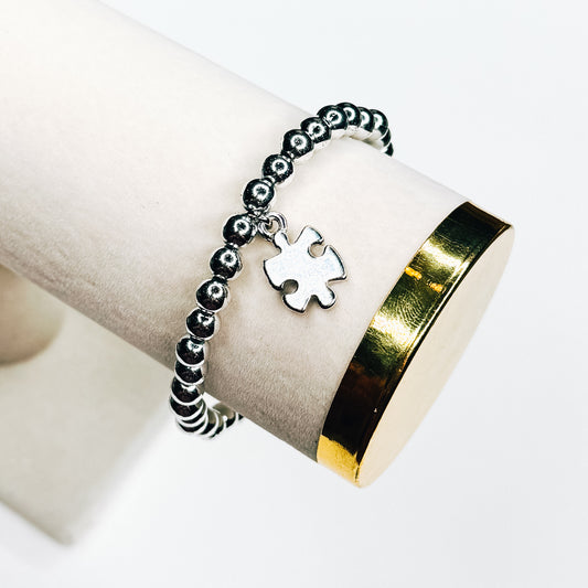 Silver Puzzle Piece Charm Bracelet