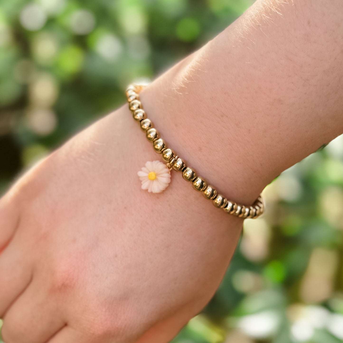 Ivory Flower Charm Gold Beaded Bracelet